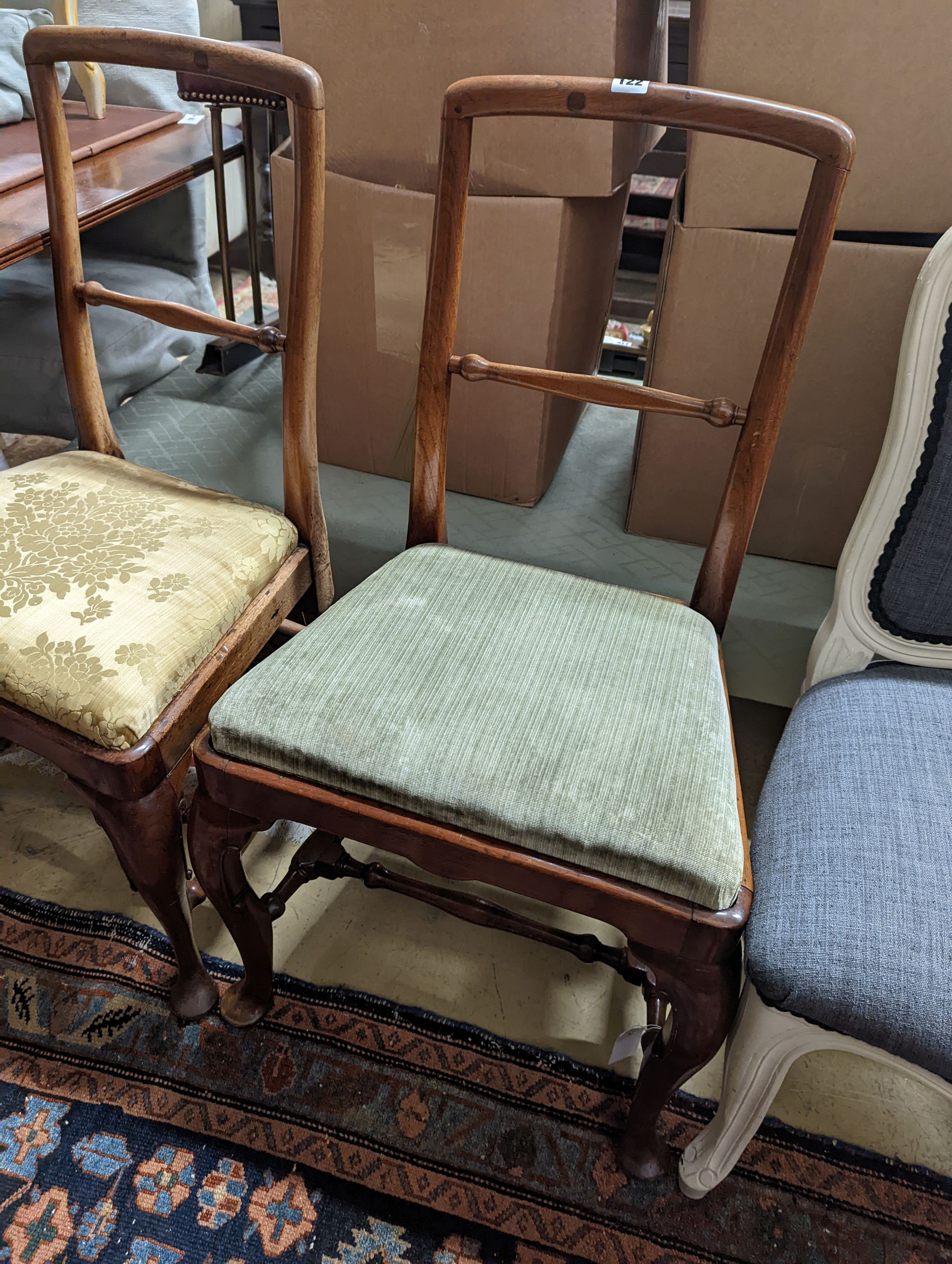 A pair of George II walnut dining chairs